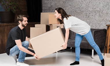 adult-man-woman-carrying-cardboard-boxes 1 (1)