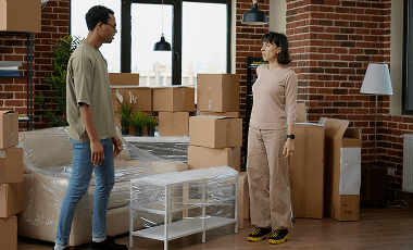 diverse-couple-moving-together-unpacking-furniture-new-home-feeling-happy-about-house-relocation-investment-new-beginnings-apartment-flat-bought-mortgage-loan 1 (1)