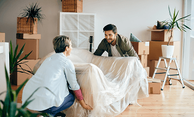 happy-couple-moving-into-their-new-apartment 1 (1)