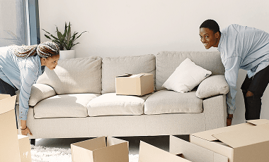 young-couple-moving-new-home-together-african-american-couple-with-cardboard-boxes 1 (1)